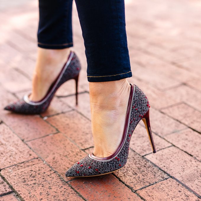 Amy Havins wears the Ferragamo Tweed pumps.