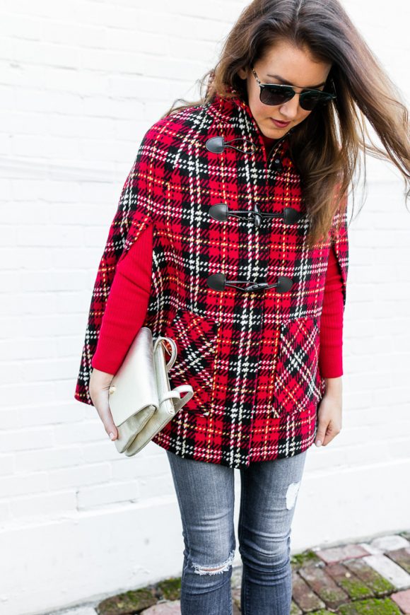 Amy Havins wears a tartan cape from Talbots.