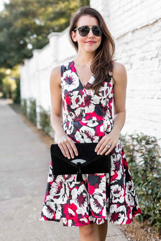 Amy Havins shares her holiday style by wearing a floral fit and flare ...